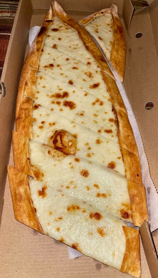 Vegetable and cheese pide.